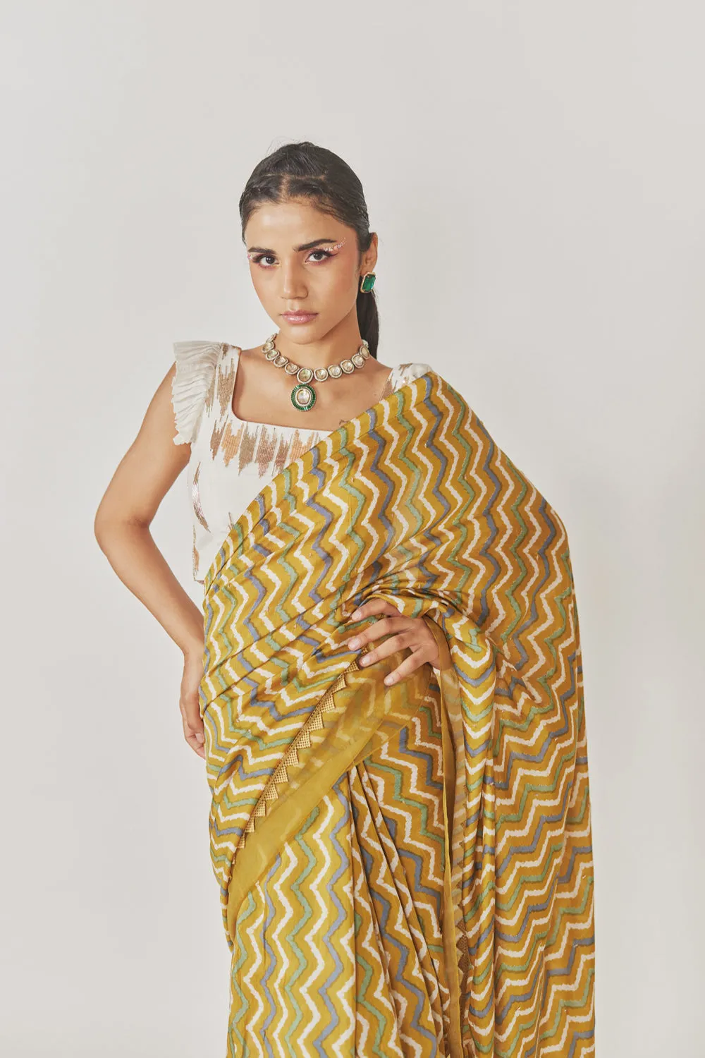 Shevron Printed Saree With Organza Border   White Embroidered Blouse