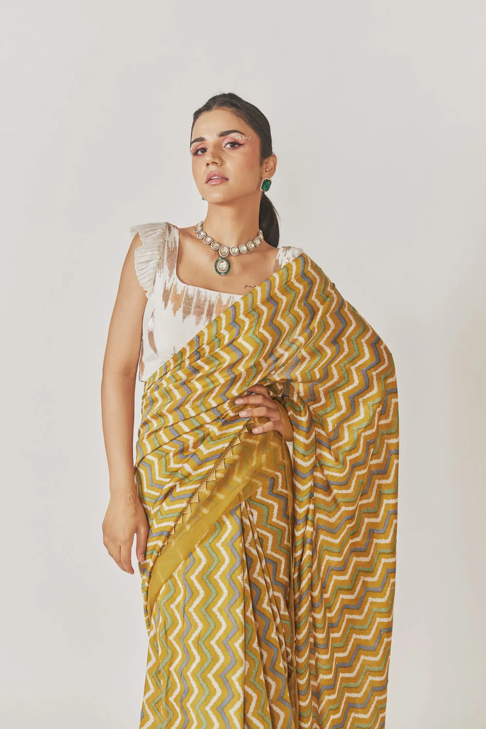 Shevron Printed Saree With Organza Border   White Embroidered Blouse